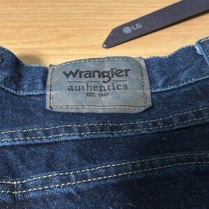 Wrangler Dark Blue Denim Jeans with Leather Logo Patch